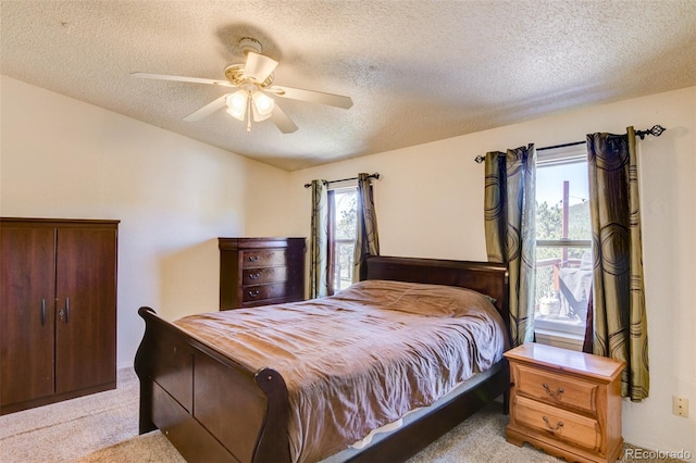 3126 Singletree Rd, Hartsel, CO 80449 - bedroom featuring light colored carpet, a textured ceiling, and ceiling fan