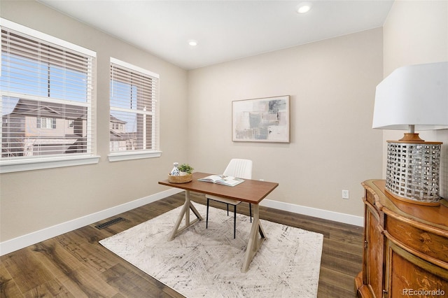 office featuring visible vents, recessed lighting, baseboards, and dark wood-style flooring