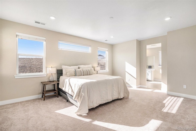 carpeted bedroom with recessed lighting, baseboards, and visible vents