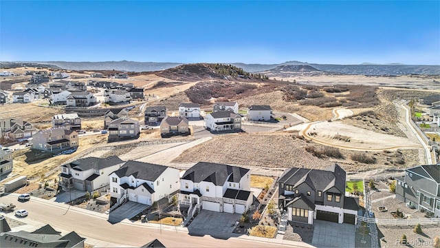 bird's eye view featuring a residential view and a mountain view