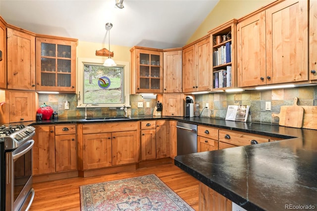 207 Kelly Rd E, Boulder, CO 80302 - kitchen featuring appliances with stainless steel finishes, light wood finished floors, vaulted ceiling, decorative backsplash, and open shelves