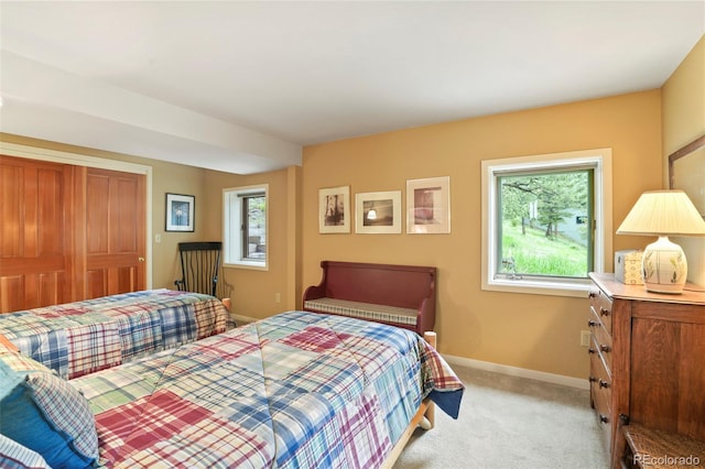 207 Kelly Rd E, Boulder, CO 80302 - bedroom featuring light carpet and baseboards