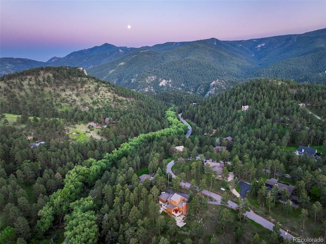 207 Kelly Rd E, Boulder, CO 80302 - aerial view at dusk of a wooded view and a mountain view