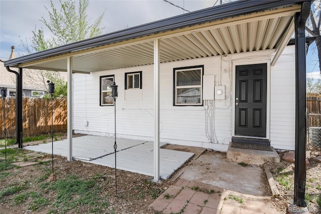 property entrance featuring fence