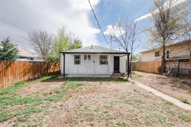 view of outbuilding featuring a fenced backyard