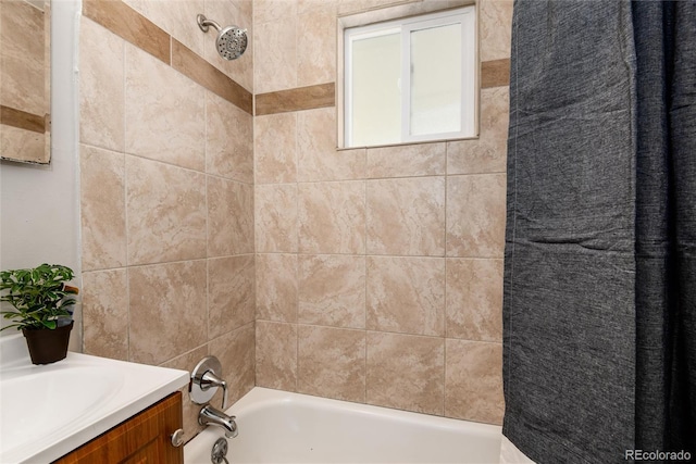 bathroom featuring shower / bath combination and vanity