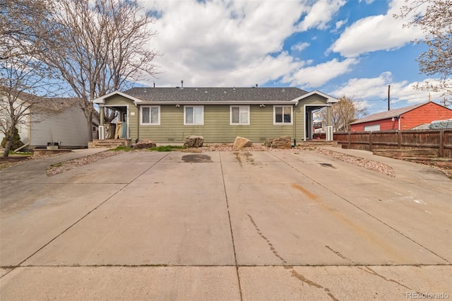 back of property with a patio