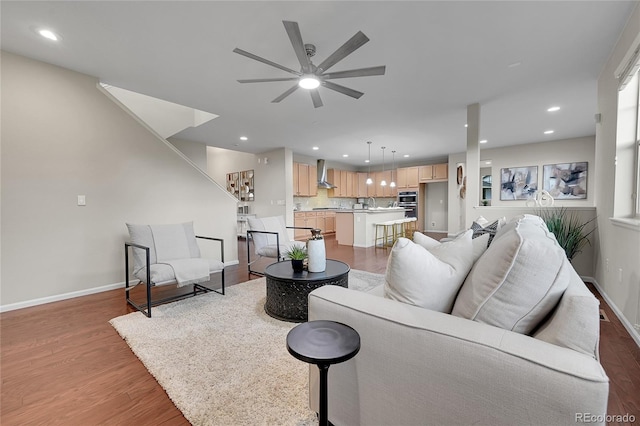 20145 E Fair Ln, Centennial, CO 80016 - living area featuring a ceiling fan, light wood finished floors, stairs, and recessed lighting