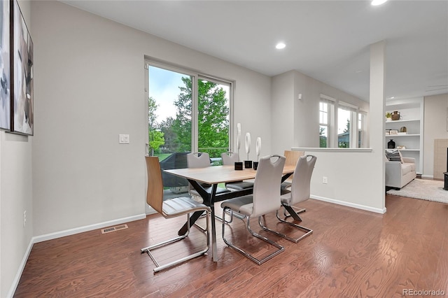 20145 E Fair Ln, Centennial, CO 80016 - dining area featuring wood finished floors, recessed lighting, and built in features