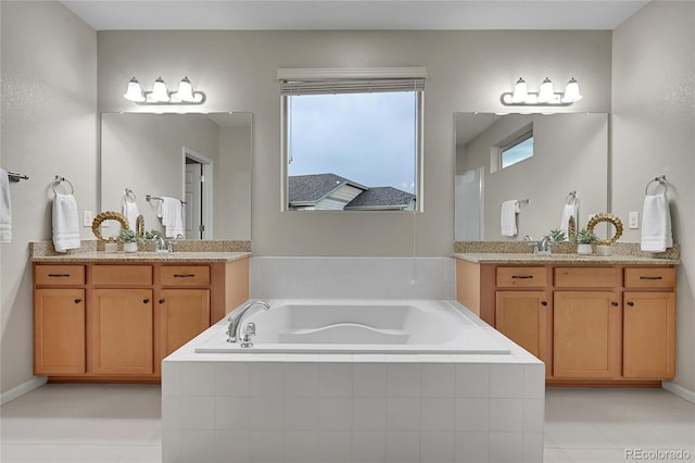 20145 E Fair Ln, Centennial, CO 80016 - bathroom with two vanities and a bath