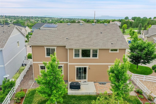 20145 E Fair Ln, Centennial, CO 80016 - back of house with a patio, a fenced backyard, roof with shingles, and a residential view