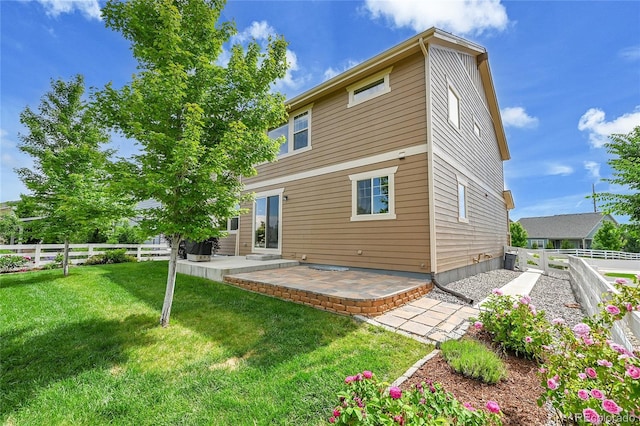 20145 E Fair Ln, Centennial, CO 80016 - back of property featuring a fenced backyard and a patio area