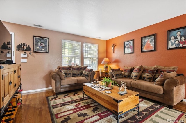 living room with dark hardwood / wood-style floors