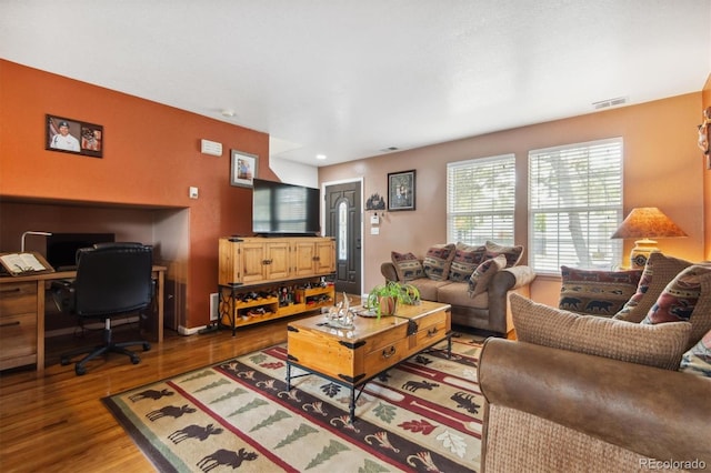 living room with hardwood / wood-style flooring