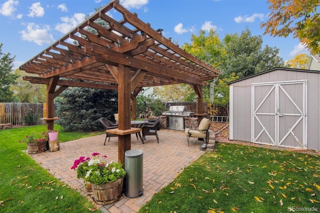 view of patio / terrace featuring a pergola and a shed