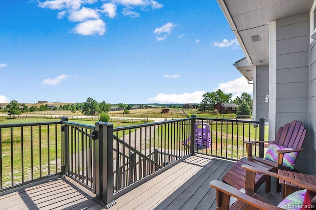 deck featuring a lawn