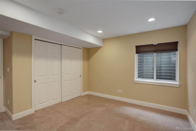 4784 Raven Run, Broomfield, CO 80023 - unfurnished bedroom with baseboards, a closet, and light colored carpet