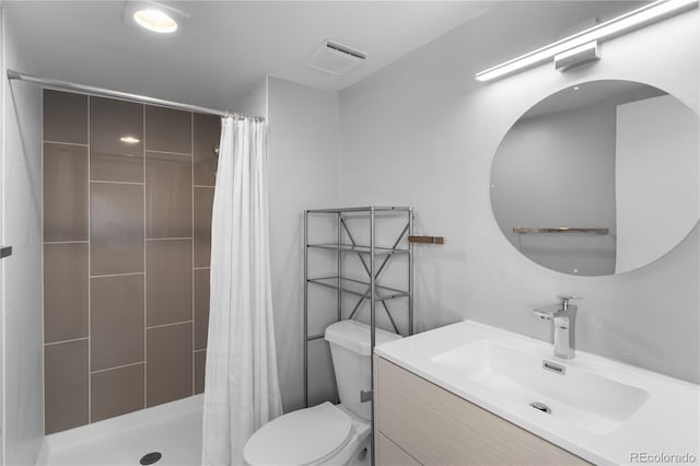 bathroom with a shower with curtain, vanity, and toilet