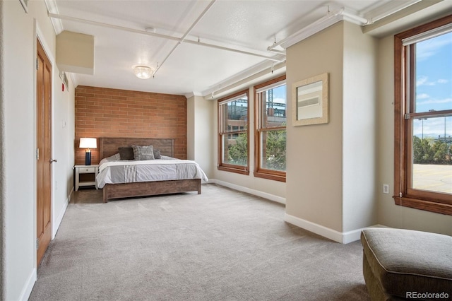 carpeted bedroom with crown molding