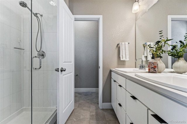 bathroom with vanity and walk in shower