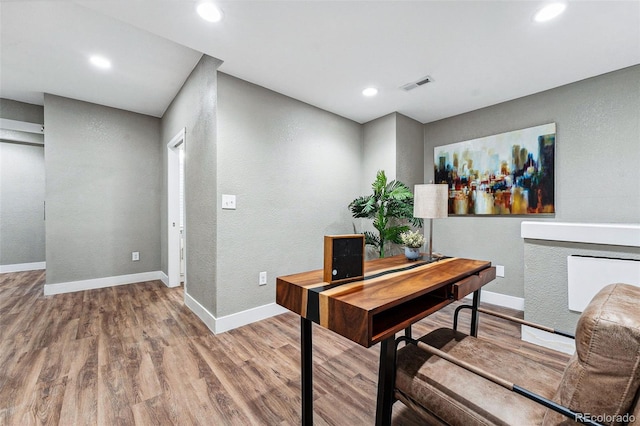 office area with hardwood / wood-style floors