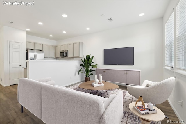 living room with dark wood-type flooring