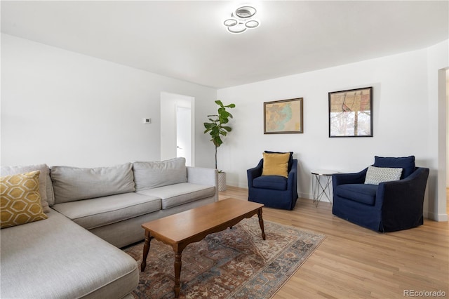 living room with light hardwood / wood-style floors