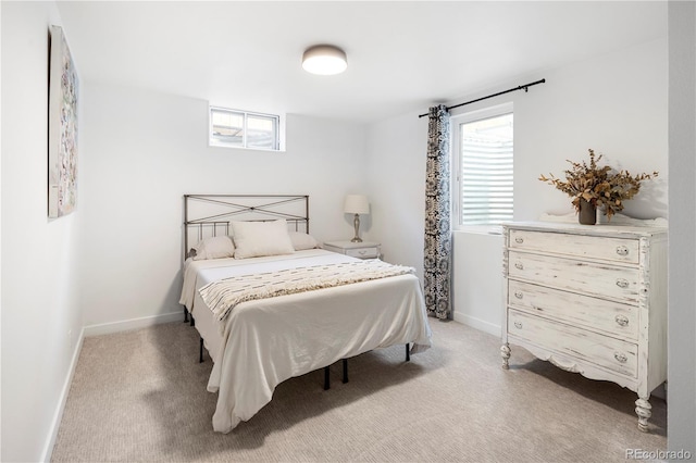 bedroom with light carpet