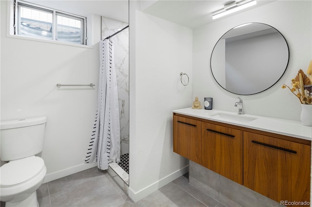 bathroom featuring toilet, vanity, and a shower with curtain