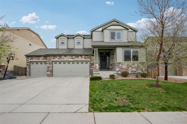 60 Stewart Way, Erie, CO 80516 - view of front of home featuring driveway, stone siding, and an attached garage