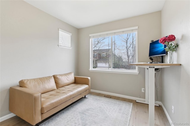 60 Stewart Way, Erie, CO 80516 - living area with wood finished floors and baseboards