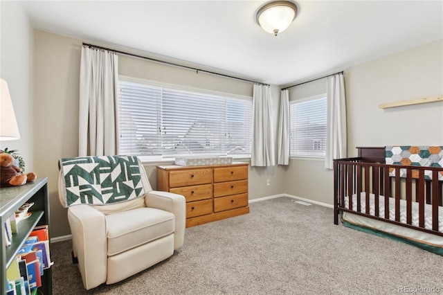 60 Stewart Way, Erie, CO 80516 - bedroom featuring carpet flooring, a nursery area, and baseboards