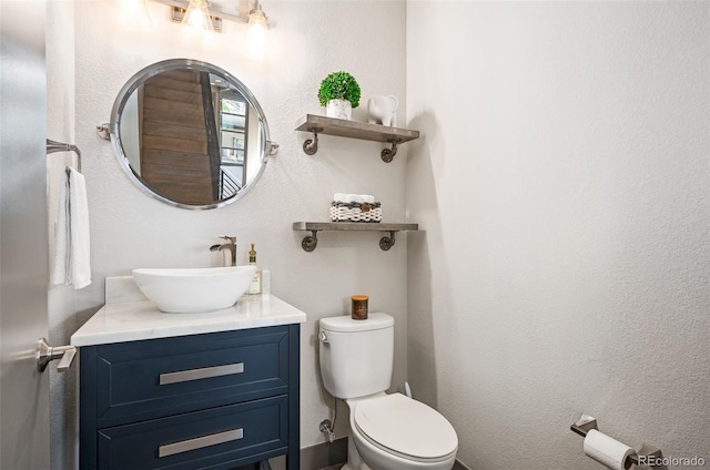 47 Harrison, Denver, CO 80206 - bathroom featuring toilet and vanity