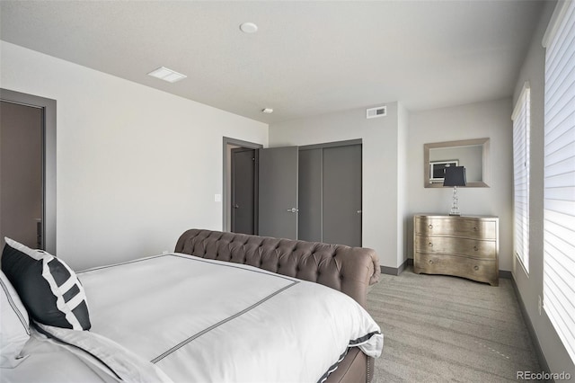 47 Harrison, Denver, CO 80206 - bedroom with light colored carpet and a closet