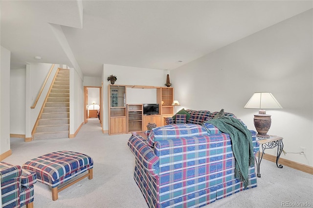 31139 Tahoe Ct, Evergreen, CO 80439 - living room featuring carpet, baseboards, and stairs