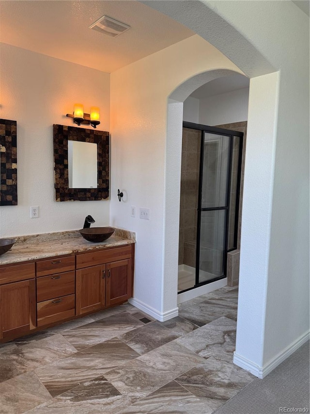 12317 W Gould Ave, Littleton, CO 80127 - bathroom with a stall shower and vanity