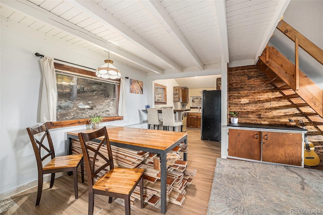200 Crest Dr, Idaho Springs, CO 80452 - dining area with light wood finished floors and beamed ceiling