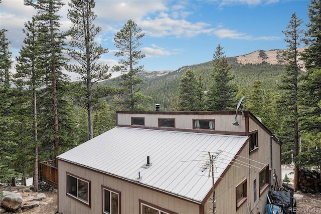 200 Crest Dr, Idaho Springs, CO 80452 - view of side of property featuring a wooded view, a mountain view, and a metal roof