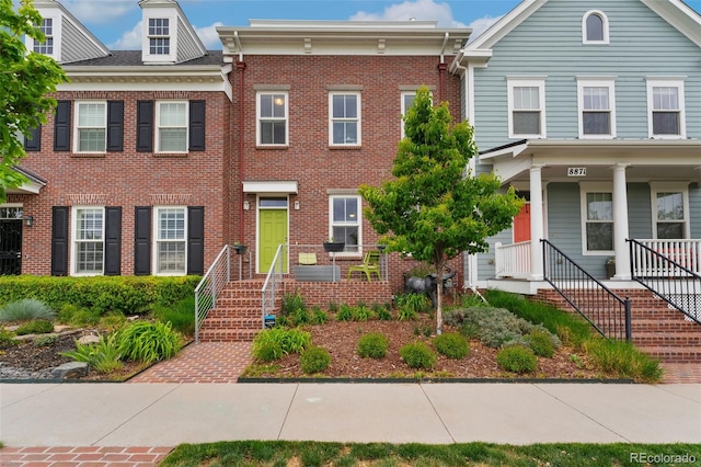 view of front of property featuring brick siding