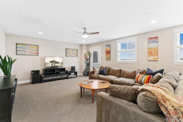 living room with carpet flooring, visible vents, a ceiling fan, and recessed lighting