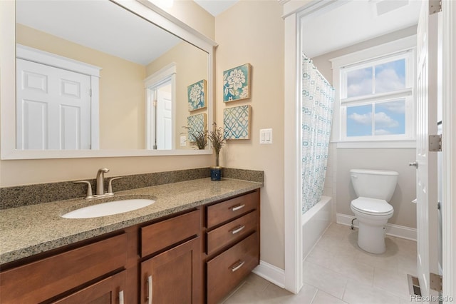 full bathroom featuring toilet, baseboards, tile patterned flooring, and vanity