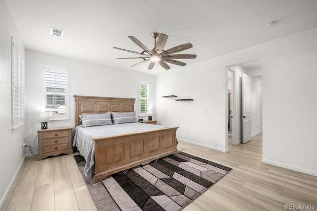 9157 Rio Lado St, Littleton, CO 80125 - bedroom featuring light wood finished floors, baseboards, and ceiling fan