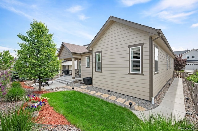 9157 Rio Lado St, Littleton, CO 80125 - rear view of property featuring a patio area