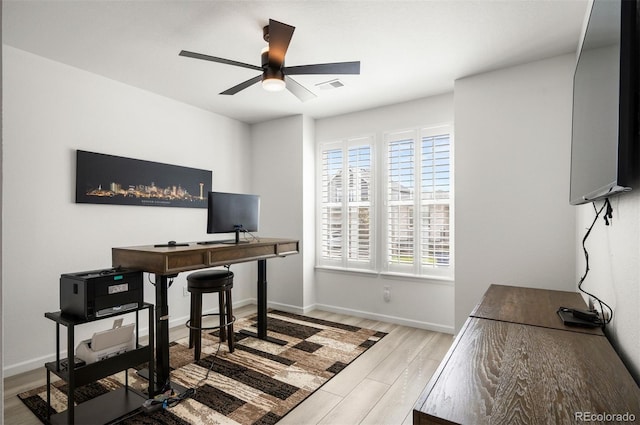9157 Rio Lado St, Littleton, CO 80125 - office space with ceiling fan, wood finished floors, and baseboards