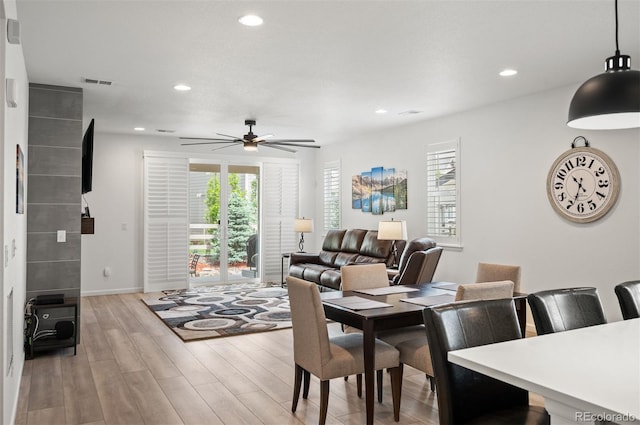 9157 Rio Lado St, Littleton, CO 80125 - dining room featuring plenty of natural light, light wood finished floors, a ceiling fan, recessed lighting, and baseboards