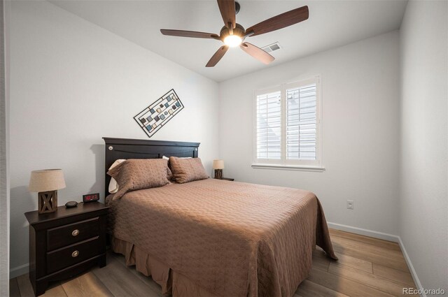 9157 Rio Lado St, Littleton, CO 80125 - bedroom featuring light wood finished floors, baseboards, and a ceiling fan