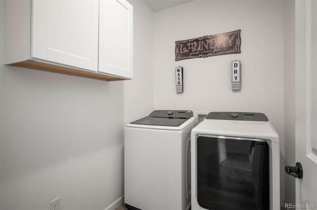 9157 Rio Lado St, Littleton, CO 80125 - washroom featuring separate washer and dryer and cabinet space