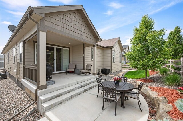 9157 Rio Lado St, Littleton, CO 80125 - view of patio / terrace with outdoor dining area