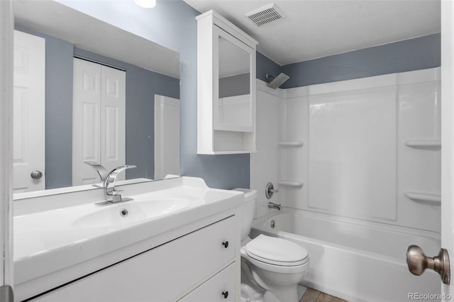 full bath featuring visible vents,  shower combination, toilet, and vanity