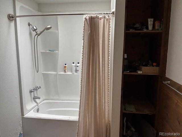 9707 County Lane 22.5, Sugar City, CO 81076 - bathroom featuring shower / bathtub combination with curtain